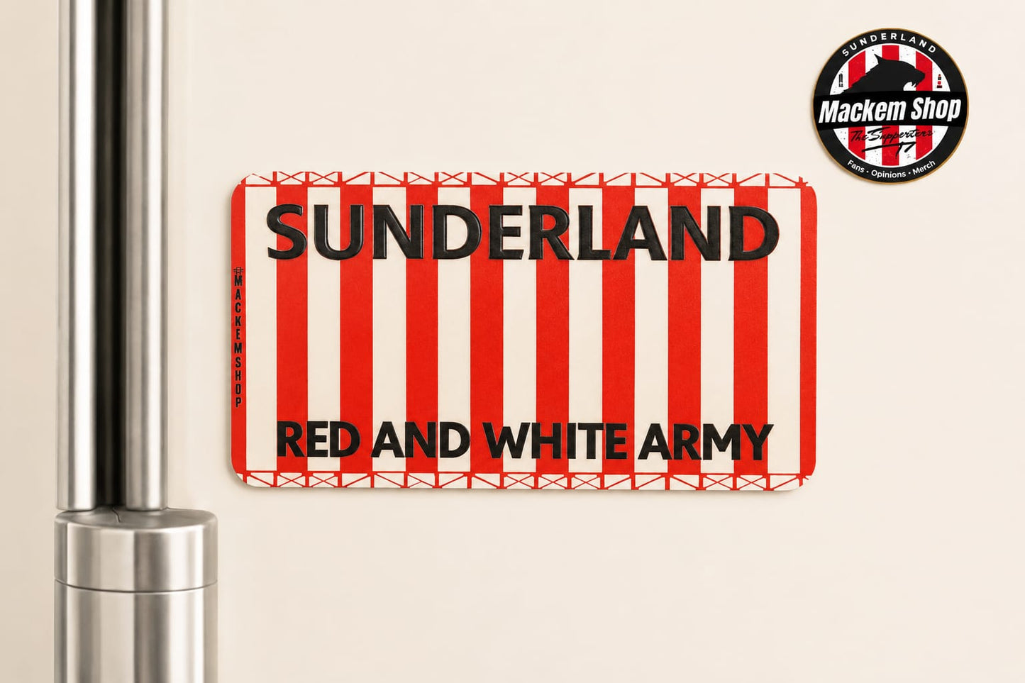 Rectangular sign with red and white stripes and 'Sunderland red and white army' text on a Fridge with beige background.