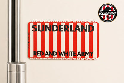 Rectangular sign with red and white stripes and 'Sunderland red and white army' text on a Fridge with beige background.