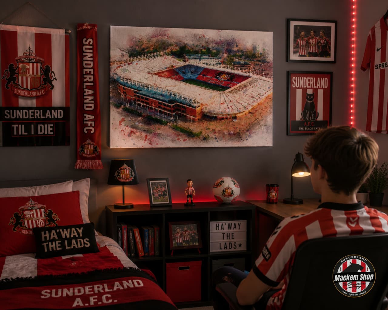 Person in a room with Sunderland A.F.C. themed decor, including posters and flags, looking at Stadium of Light art canvas by MackemShop.