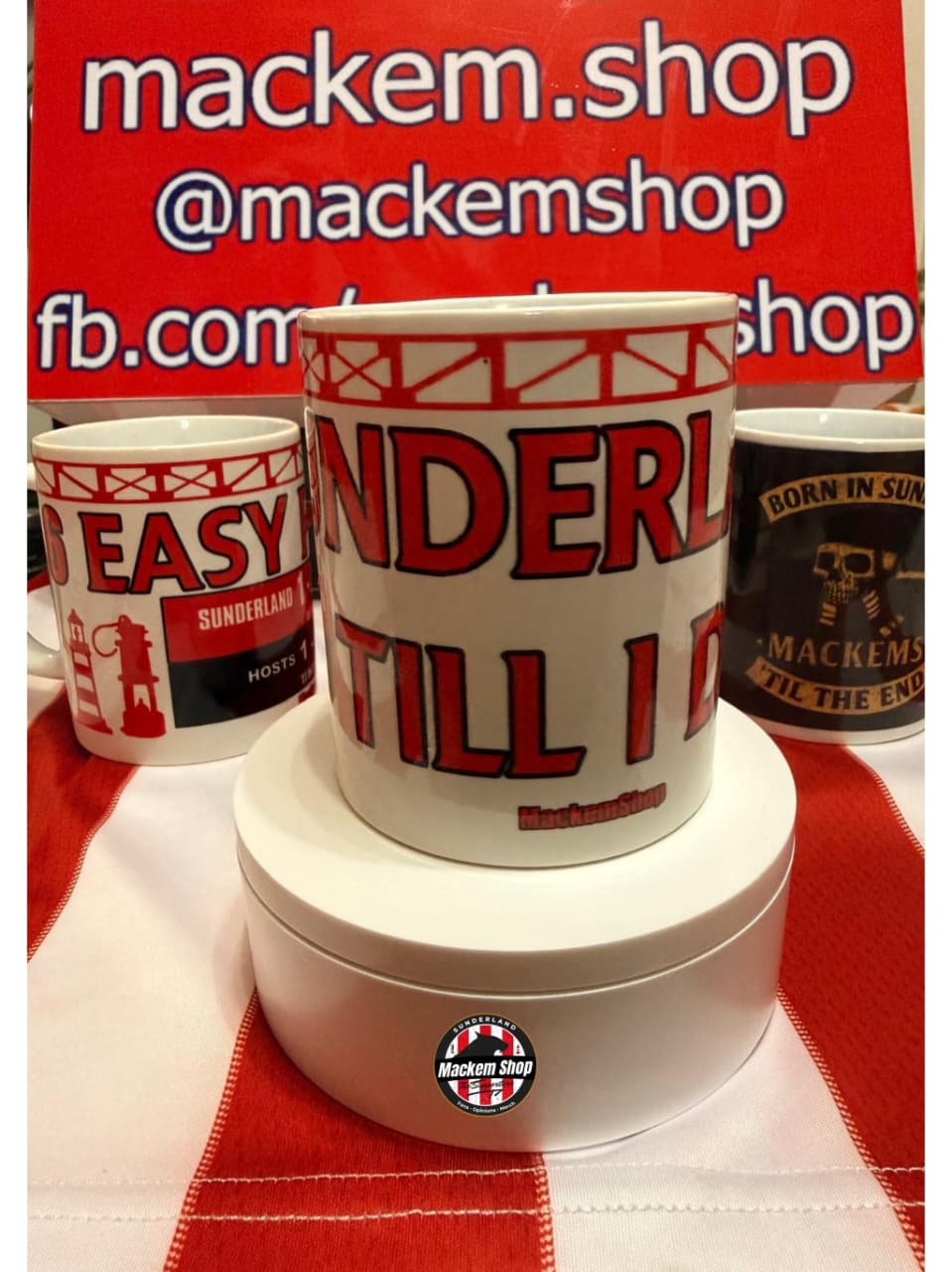 Mugs with text and branding on a red and white checkered tablecloth, with 'mackem.shop' visible.