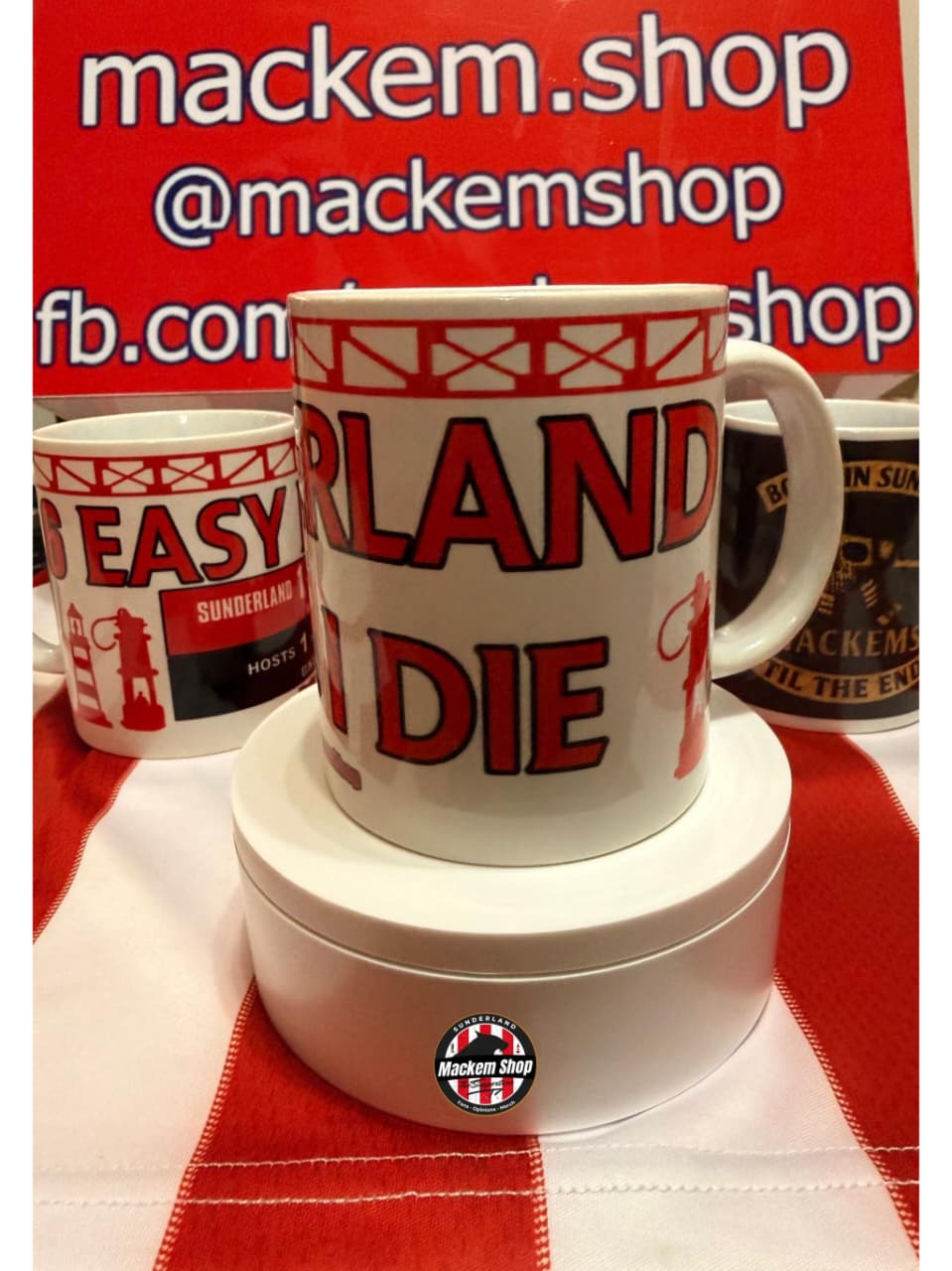 White mug with Sunderland Till i die text on a red and white checkered tablecloth, with 'mackem.shop' branding in the background.