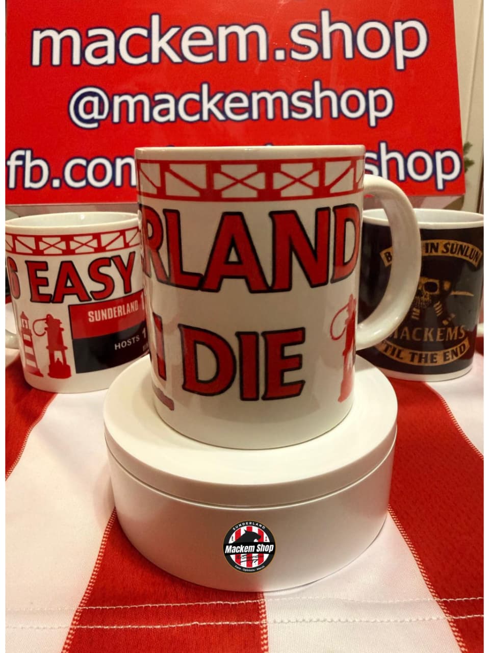 Mug with 'SUNDERLAND Till I DIE' text on a red and white checkered tablecloth, with 'Mackem. Shop' branding in the background.