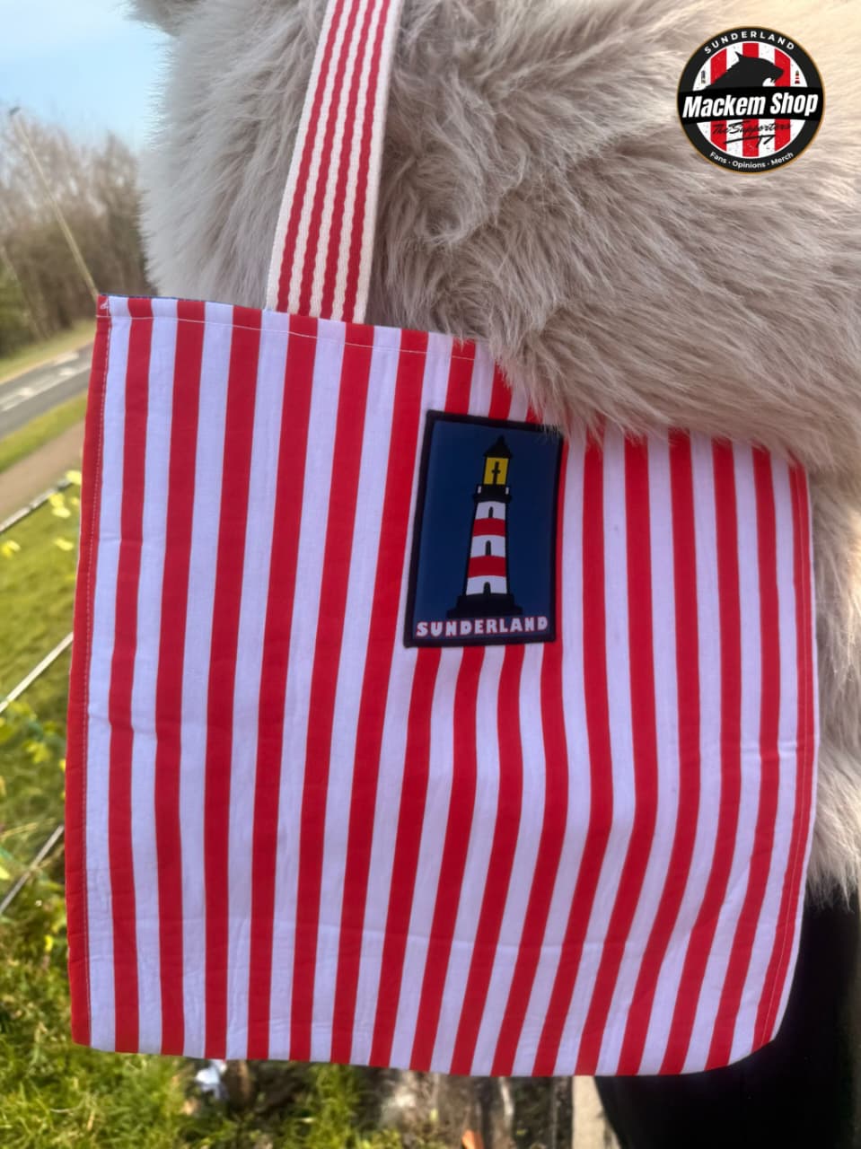 Red and white striped Tote bag with Sunderland Lighthouse Sign embraided on the bag.