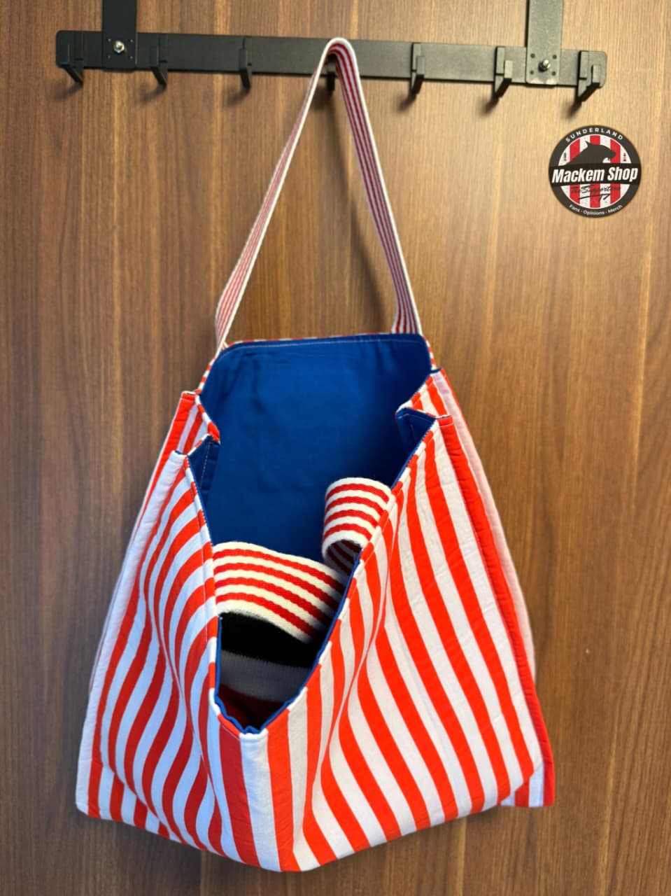 Sunderland tote bag open view showing royal blue inner lining and storage space