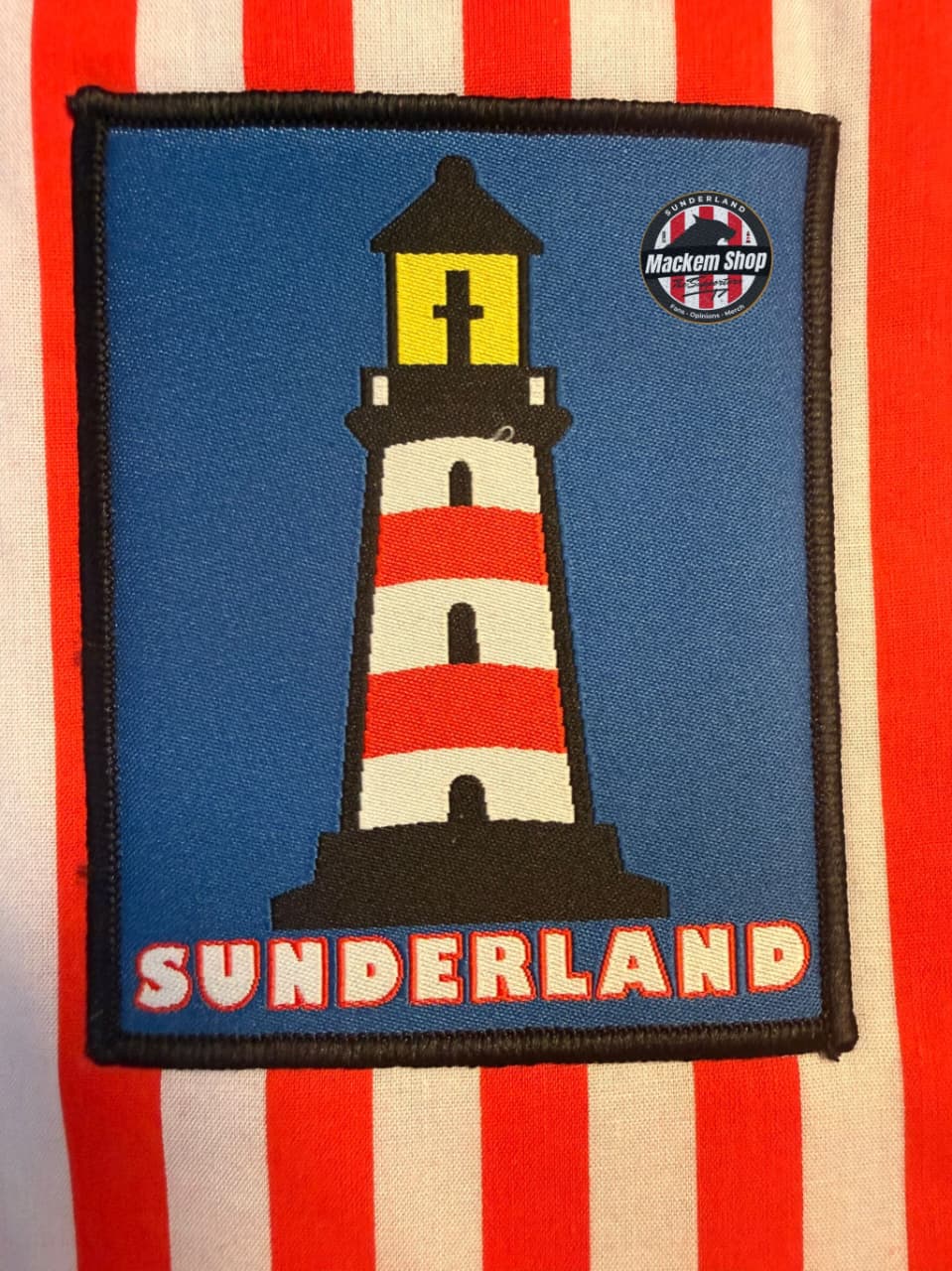 Sunderland lighthouse patch close up on striped tote bag