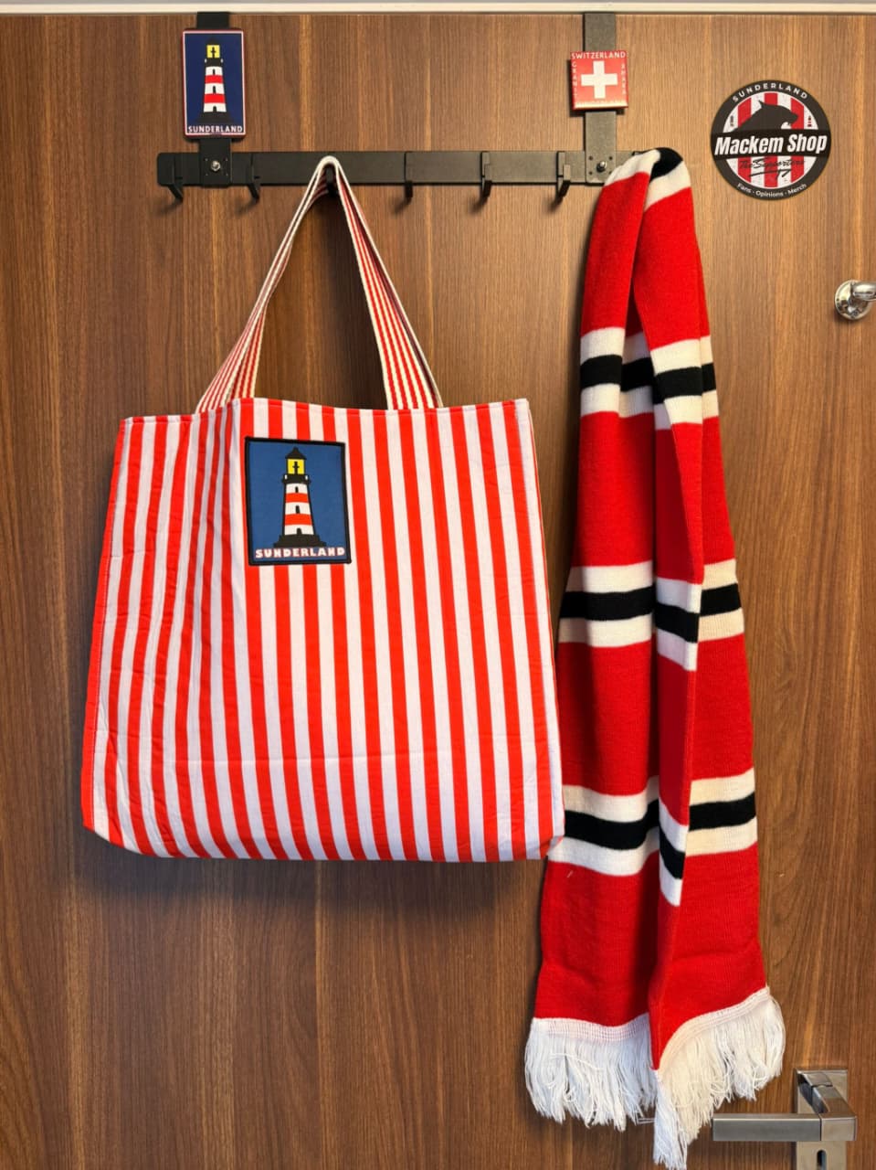 Sunderland tote bag hanging next to red and white scarf matchday styling