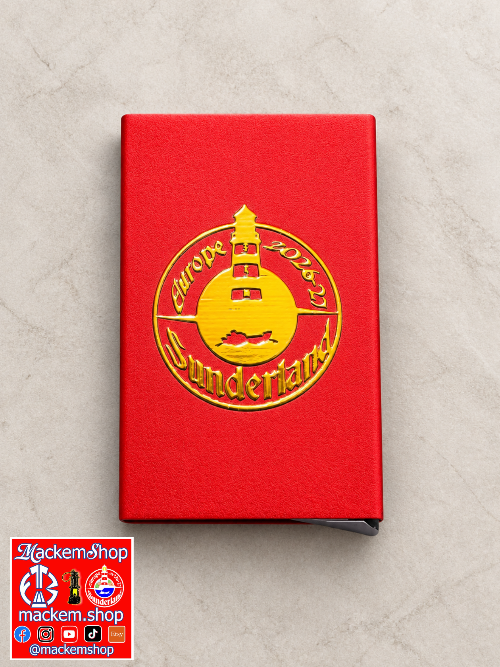 A red RFID Card Wallet with a gold circular emblem featuring a lighthouse and the text 'Europe 2026-27 Sunderland', photographed on a light gray marble surface. A 'MackemShop' logo overlay is in the bottom-left corner.