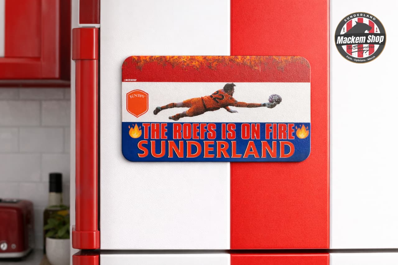 Fridge with a decorative magnet featuring a footballer and text, with a Mackem Shop logo in the corner.