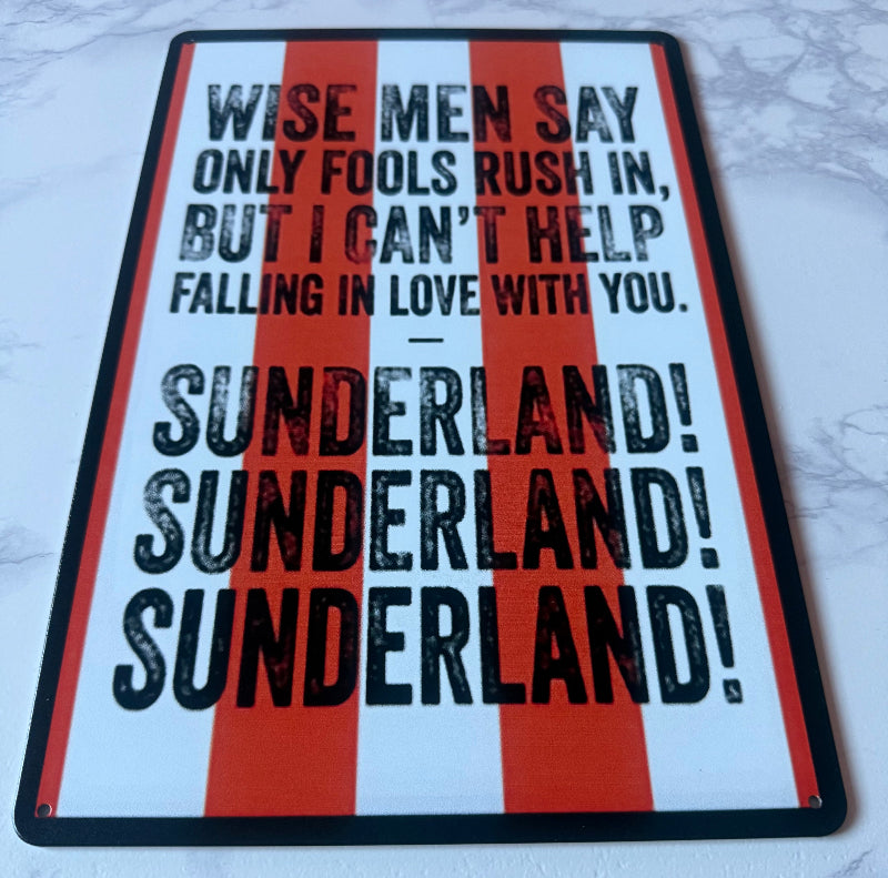 Sign with text and red stripes on a white background