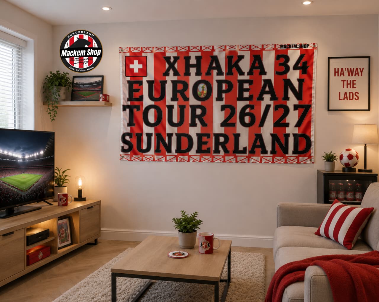 Living room with a large banner featuring 'Xhaka 34 European Tour 26/27 Sunderland' on the wall.