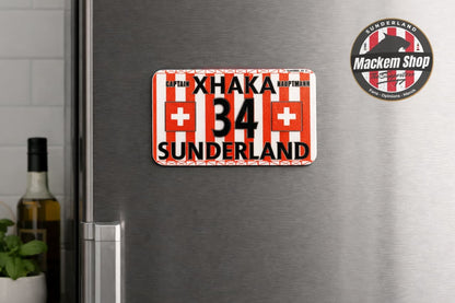 Fridge magnet by Mackem Shop with red and white striped design, number 34, and text on a metallic surface.