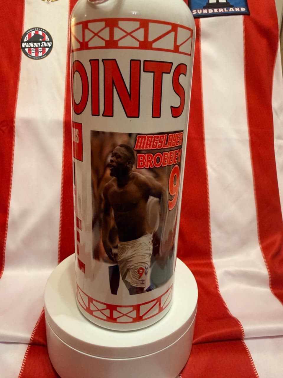 Water bottle with print consisting of Brian Brobbey shirtless celebration against newcastle united.