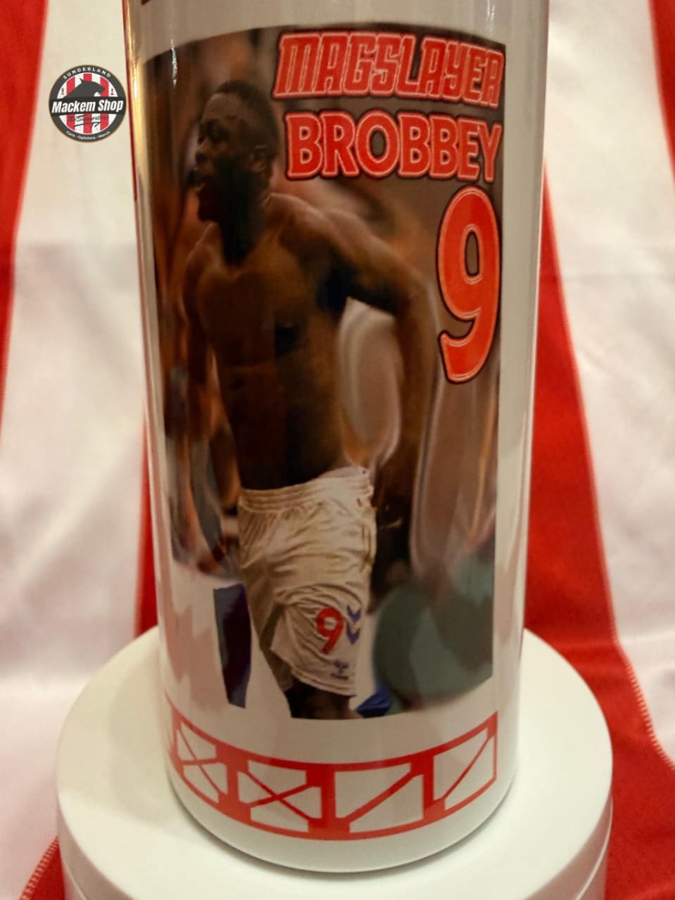 Water bottle with a Brian Brobbey shirtless celebration Print and 'Mackem Shop' branding on a red and white background